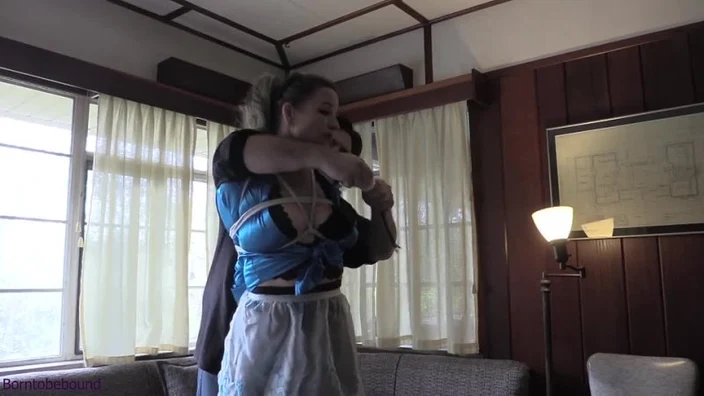 Cleaning lady drinking and tied up